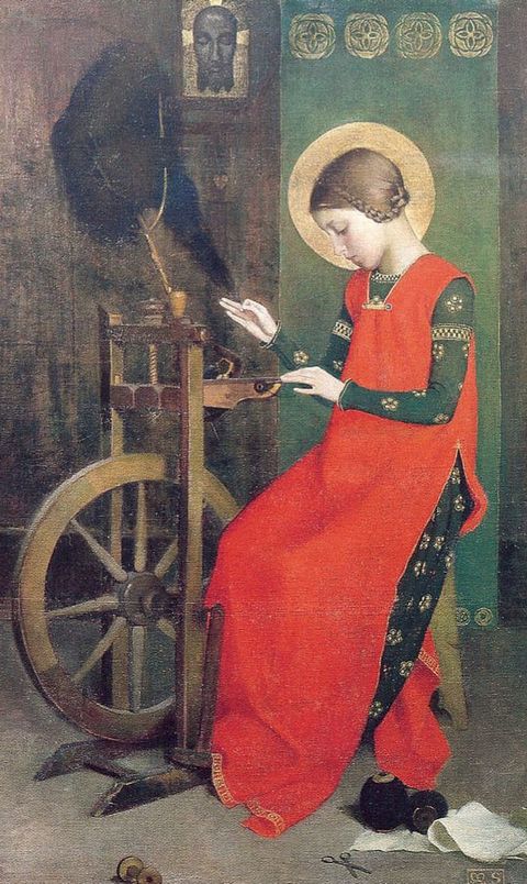 Painting. Facing our left in profile, a light-skinned woman in a bright crimson dress, Saint Elizabeth of Hungary, sits at a spinning wheel and looks down at her working hands against a dark green and brown background. A flat, gold halo surrounds her head and an image of the face of Christ hangs on the wall above her.